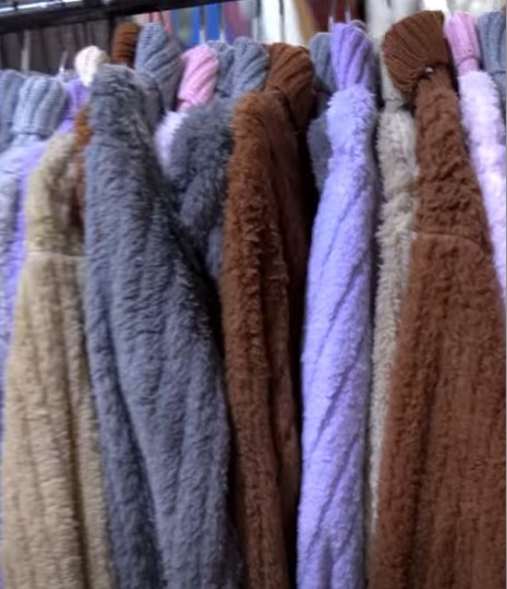 توزيع الألبسة الجديدة للعيد على 1067 عائلة من المدرجين من الأيتام والأرامل والمطلقات